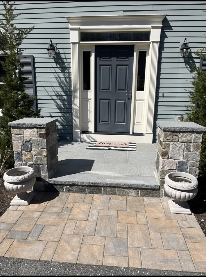 Finished stone entry with paver landing
